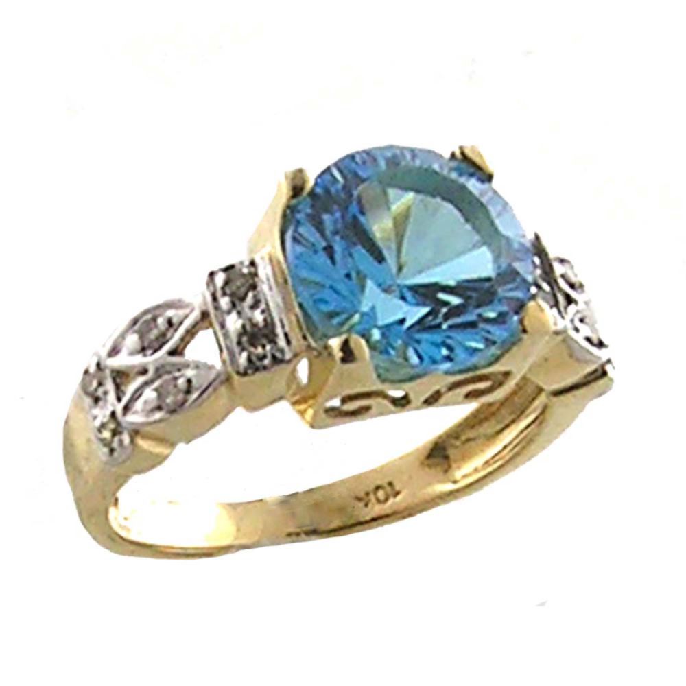 Blue Topaz and Diamond Accent Ring. 10k