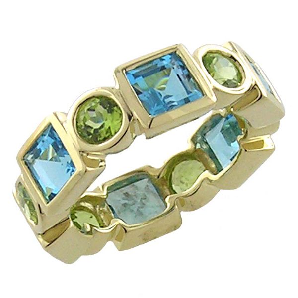 Peridot And Blue Topaz Ring. 10K Yellow Gold