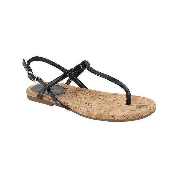Diba Women's Stop Her Sandals (Black Patent). Don't even try to put the brakes on the traffic-stopping minimalistic style of the chic Stop Her sandals by Diba. Patent leather upper in a casual slingback thong sandal style with a round open toe and comfortable patent toe thong post. Slender T-strap with side elastic panel overlaps adjustable sling heel strap with rectangular metal buckle closure. Smooth lining and contoured cork footbed flexible midsole. Rubber traction outsole.