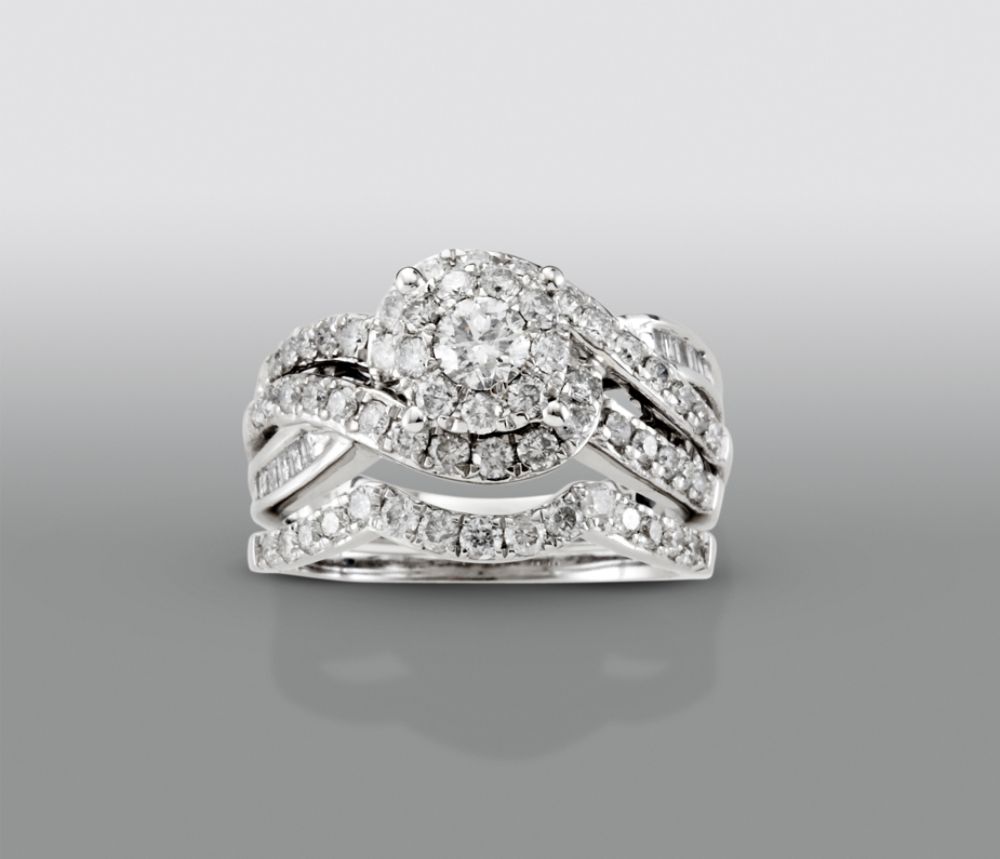 From the David Tutera Radiance Collection this spectacular two piece ring 