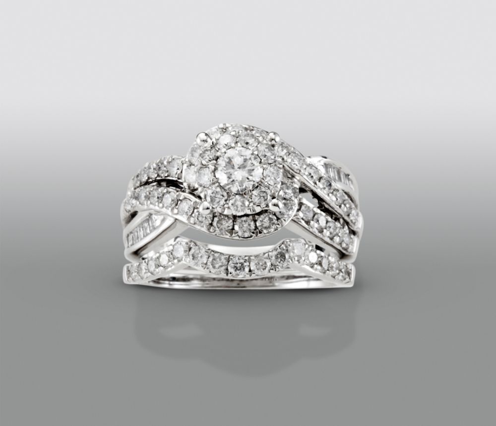 From the David Tutera Radiance Collection this spectacular two piece ring